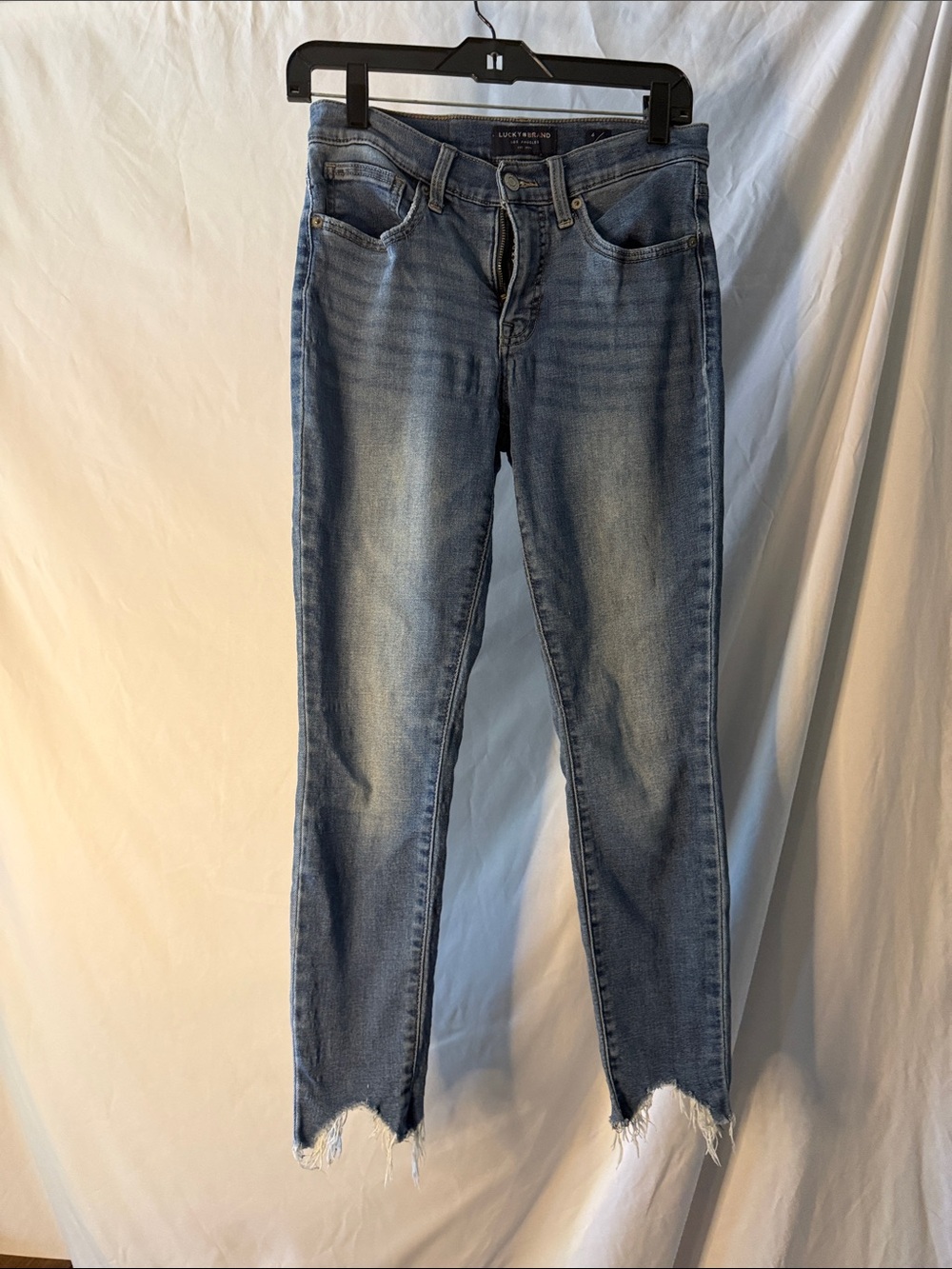 Lucky Brand Light Blue Skinny Jeans with Distressed Hem
